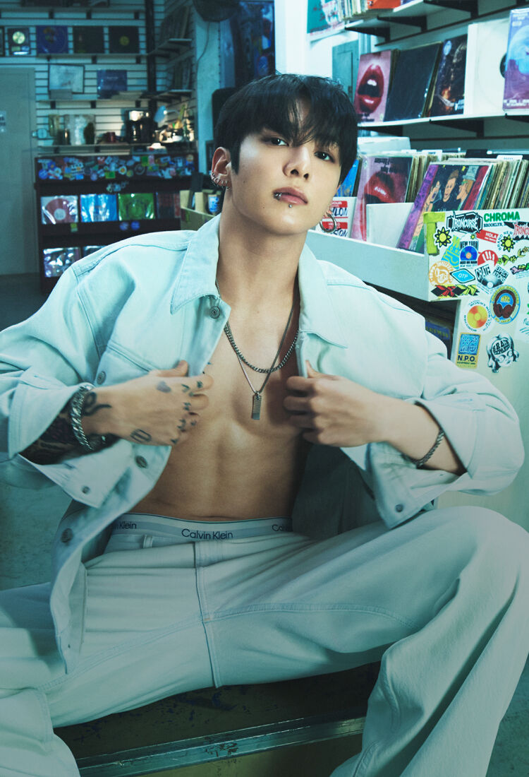 Calvin Klein Jung Kook Goes Baggy Living for bleached out denim. A look for the record.